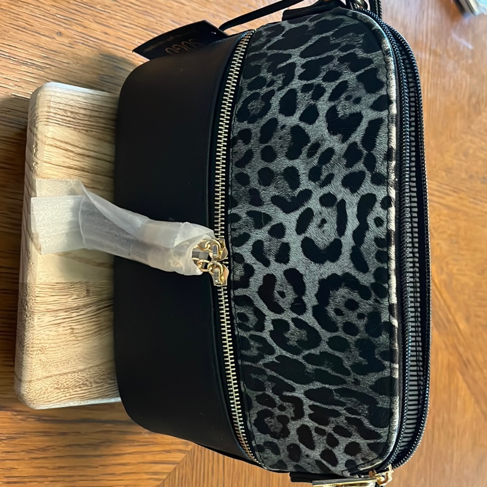 NWT SUGU Cheetah purse.